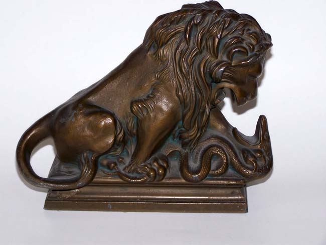 A Pair of Antique Bookends circa 1925 depicting a Lion fighting a Serpent — image 2